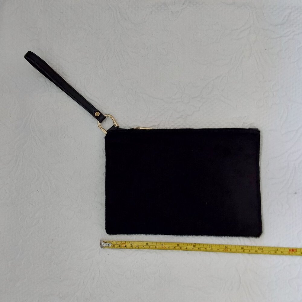 A New Day faux pony hair clutch with gold accents and inside pockets